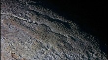 The dragon scale appearance of Tartarus Dorsa on Pluto that is captured by NASA's New Horizons mission.