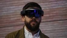 This Microsoft HoloLens is  a set of goggles and software that imposes computer-generated images over real-world scenes for about $3,000 cost.