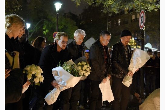 Bono together with U2 members paid respect and placed flowers near the Bataclan concert theatre