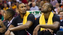 Miami Heat's Chris Bosh (L) and Dwayne Wade