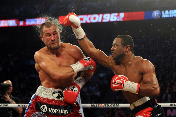 Former lightweight champion Jean Pascal connects with a right hook against Sergey Kovalev