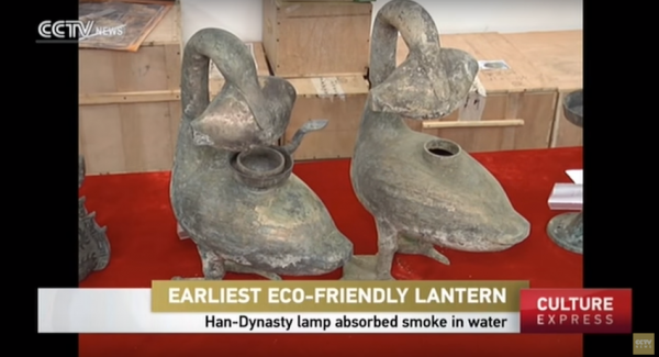 2000-year-old "Haihunhou's" smoke-swallowing bronze lamps resembling like a goose with a fish on its mouth