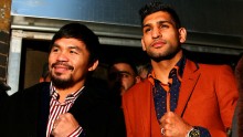 Manny Pacquiao (L) and Amir Khan