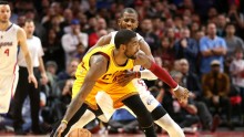 Cleveland Cavaliers point guard Kyrie Irving posts up against Los Angeles Clippers' Chris Paul