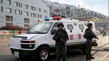  A general view of security personnel outside Beijing National Stadium