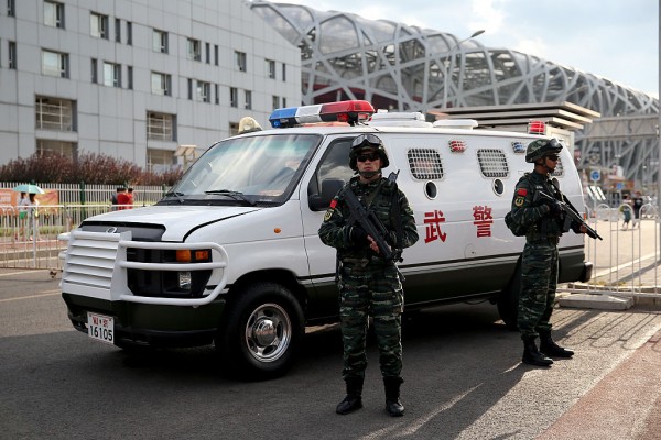  A general view of security personnel outside Beijing National Stadium