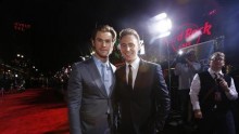 Cast members Chris Hemsworth (L) and Tom Hiddleston pose at the premiere of ''Thor: The Dark World'' at El Capitan theatre in Hollywood.
