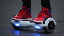 A youth poses as he rides a hoverboard, which are also known as self-balancing scooters and balance boards, on October 13, 2015 in Knutsford, England.