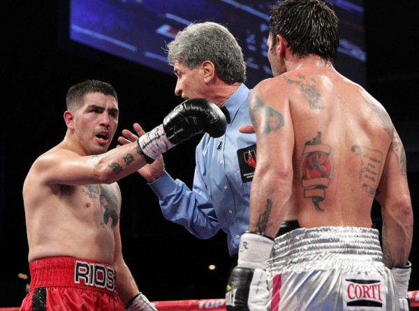 Referee Vic Drakulich warning both Brandon Rios and Diego Chaves during their fight at the Cosmopolitan in Las Vegas