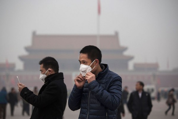 Tourists Puts On Mask To Protect Himself From Pollution