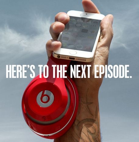Apple ad announcing acquisition of Beats