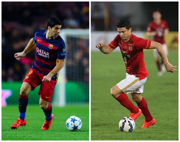 FC Barcelona's Luis Suárez (L) and Guangzhou Evergrande's Elkeson