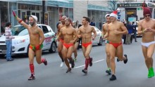  Santa Speedo participants running the streets of Yorkville and Back Bay