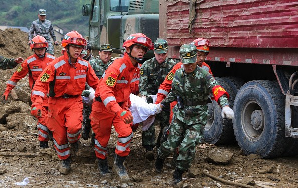 Rescue workers pulled out first survivor of the tragic Shenzhen landslide
