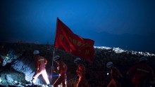 Chinese rescue team search for possible survivors 24/7.