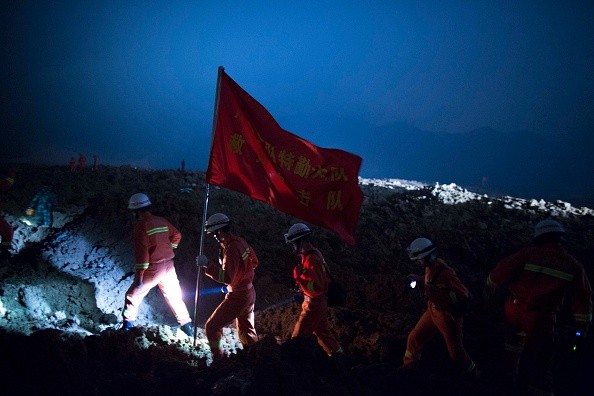 Chinese rescue team search for possible survivors 24/7.