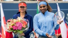 Serena Williams claiming her Rogers Cup title in 2013 along with second place finisher Romanian Sorana Cirstea