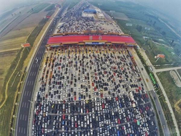 With Beijing's growing problem on traffic congestion, different political analysts have a solution in mind
