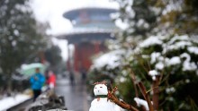 Beijing Welcomes Its New Year's First Snow