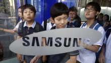Students walk out of Samsung Electronics' headquarters