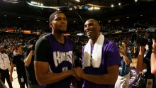 Sacramento Kings' Rudy Gay (L) and Los Angeles Lakers' Kobe Bryant