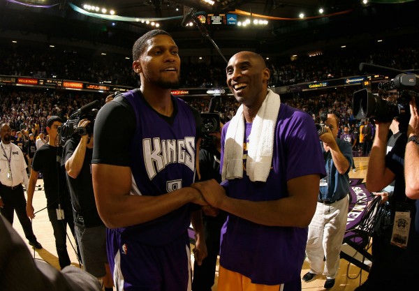 Sacramento Kings' Rudy Gay (L) and Los Angeles Lakers' Kobe Bryant