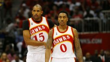 Atlanta Hawks' Al Horford (L) and Jeff Teague