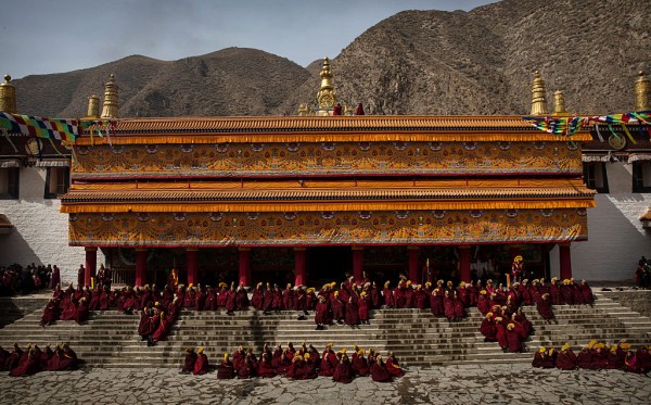 Tibetan Buddhist monks gather during Monlam or the Great Prayer rituals 