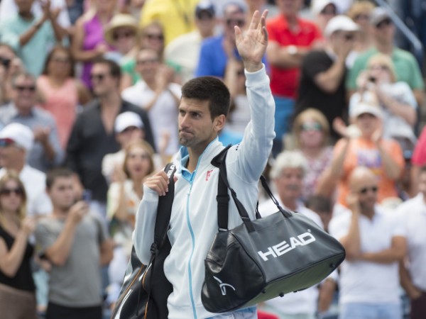 Novak Djokovic bid fans farewell as the Serb is eliminated by Frenchman Jo-Wilfried Tsonga in the third round of the Rogers Cup