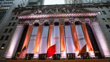 Alibaba Group signage is posted outside the New York Stock Exchange