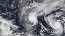 Hurricane Iselle and Hurricane Julio (R) are pictured en route to Hawaii 