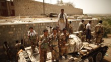 Army soldiers stand atop a tank at their position in Jaar of Yemen's southern province of Abyan, after the army retook it from al Qaeda-linked militants June 15, 2012.