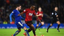 West Brom striker Saido Berahino competes for the ball against Leicester City's Christian Fuchs