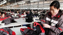Clothing factories like this one in the province of Jiangsu are fueling China's big surge in textile exports.
