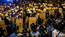 Chinese miners gather in a protest against back pay and false governor's claim