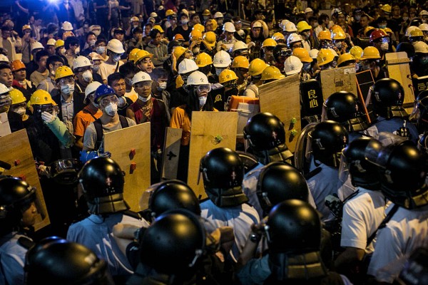 Chinese miners gather in a protest against back pay and false governor's claim