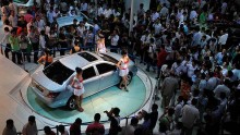 China's First Mass-produced Electric Vehicle Unveiled At High-tech Fair