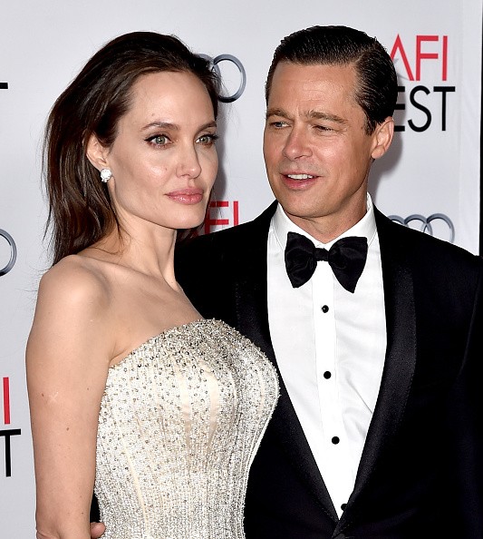 Angelina Jolie Pitt and Brad Pitt arrive at the AFI FEST 2015 presented by Audi opening night gala premiere of Universal Pictures' 'By The Sea' at the Chinese Theatre on Nov. 5, 2015 in Los Angeles, California. (Photo: Kevin Winter/Getty Images)