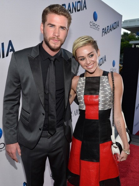 Liam Hemsworth and Miley Cyrus attend the premiere of Relativity Media's 'Paranoia' at DGA Theater on Aug. 8, 2013 in Los Angeles, California. (Photo: Frazer Harrison/Getty Images for Relativity Media)