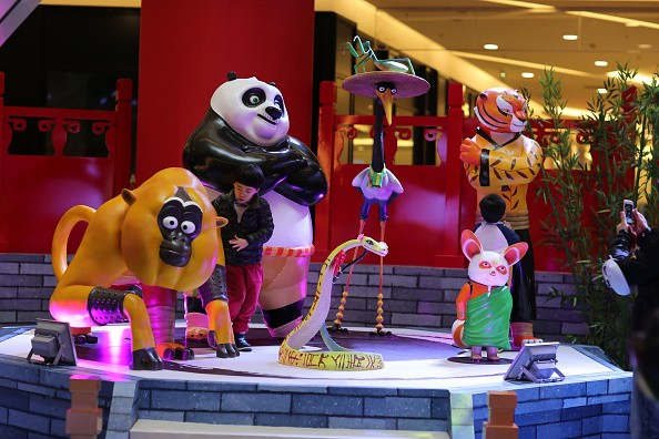 People look at the Kung Fu Panda 3 exhibition at a shopping mall on Dec. 19, 2015 in Kunming, Yunnan Province of China. Sculptures of cartoon roles and scenes of American-Chinese computer-animated film 'Kung Fu Panda 3' were on display at a shopping mall 