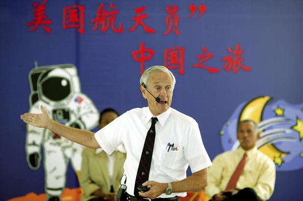 China is set to hike its budget for space research. US retired astronaut Charles M. Duke delivers a speech as he visits a research center of DuPont Company with the other two astronauts Mae C. Jemison (L) and Charles F. Bolden R) on Aug. 2, 2005 in Shangh