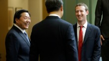 hinese President Xi Jinping (C) talks with Facebook Chief Executive Mark Zuckerberg (R) as Lu Wei, China's Internet czar, looks on during a gathering of CEOs and other executives at the main campus of Microsoft Corp Sept. 23, 2015 in Redmond, Washington. 