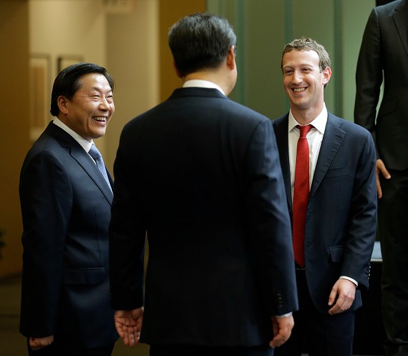 hinese President Xi Jinping (C) talks with Facebook Chief Executive Mark Zuckerberg (R) as Lu Wei, China's Internet czar, looks on during a gathering of CEOs and other executives at the main campus of Microsoft Corp Sept. 23, 2015 in Redmond, Washington. 