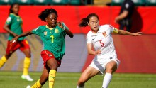 Wu Haiyan #5 of China PR in action against Gabrielle Onguene #7 of Cameroon during the FIFA Women's World Canada 2015 Round of 16 match between China PR and Cameroon at Commonwealth Stadium on June 20, 2015 in Edmonton, Canada. (Photo: Kevin C. Cox/Getty 