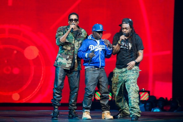 Q-Tip, Phife Dawg and Jarobi White of A Tribe Called Quest perform at Barclays Center on November 20, 2013 in New York City.