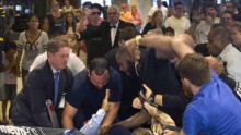 UFC light heavyweight champion Jon Jones attempts to land a punch against challenger Daniel Cormier at a recent media fan event