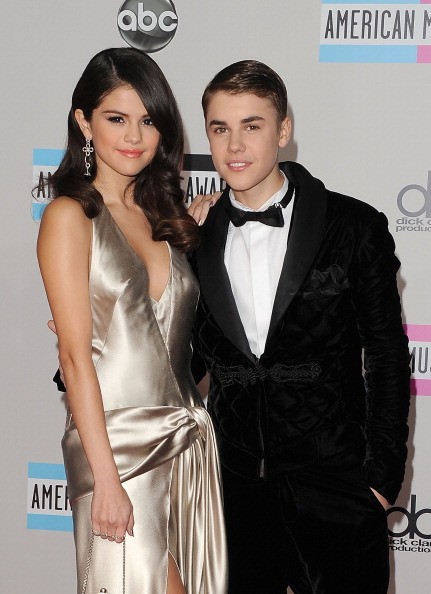 Singers Selena Gomez (L) and Justin Bieber arrive at the 2011 American Music Awards held at Nokia Theatre L.A. LIVE on Nov. 20, 2011 in Los Angeles, California. (Photo: Jason Merritt/Getty Images)