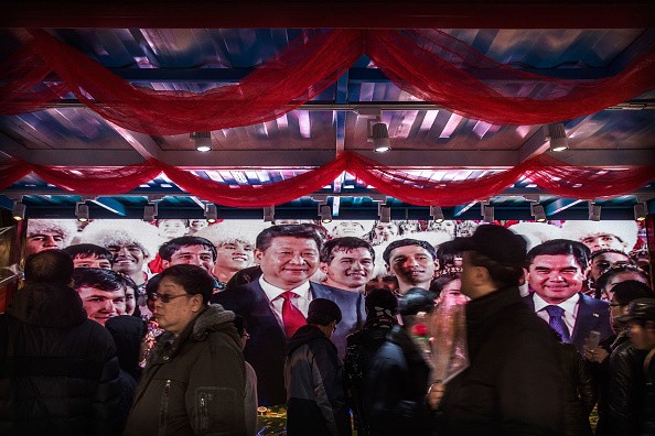 Chinese president and leader of the Communist Party Xi Jinping is seen on a television monitor at a government promotional booth at a local fair during Spring Festival celebrations on Feb. 10, 2016 in Beijing, China. (Photo: Kevin Frayer/Getty Images)