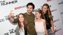 Dylan O'Brien poses with fans at the Twentieth Century Fox and Teen Vogue screening of 'The Maze Runner' at SVA Theater on Sep. 15, 2014 in New York City. (Photo: Dimitrios Kambouris/Getty Images)