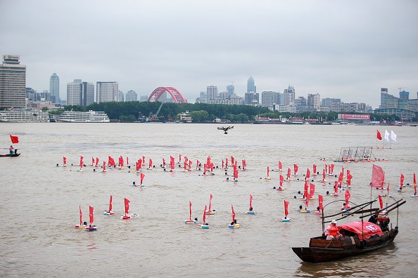 More than 3,500 participants in 38 teams attend the 42nd International Yangtze River Crossing Activity at Wuhan section of Yangtze River on July 16, 2015 in Wuhan, Hubei Province of China. (Photo: ChinaFotoPress/ChinaFotoPress via Getty Images)